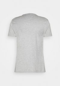 Grå kortærmet T-shirt lavet af blødt bomuld, med rund halsudskæring og en afslappet pasform, uden synlige mønstre eller hardware.