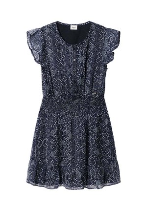 Vestido corto azul marino con patrón floral geométrico blanco, mangas tipo capa, cintura elástica y detalles de botones en el pecho delantero.