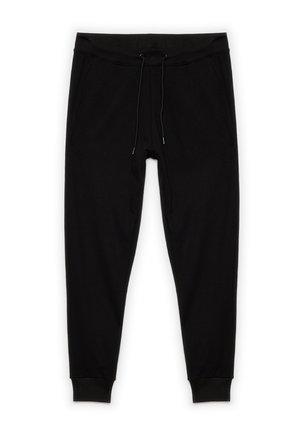 Pantalones deportivos negros hechos de tela suave con una cintura elástica, cordón ajustable, bolsillos laterales y puños ajustados.