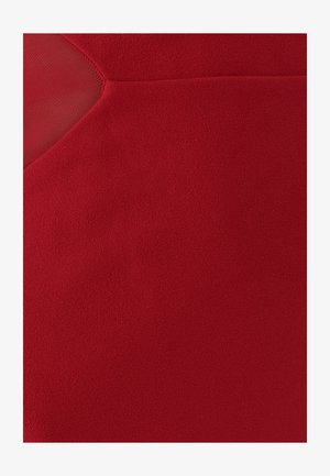 Rode stof met een gladde, licht gestructureerde oppervlakte en een netpaneel aan de zijkant, dat een contrasterend materiaal en ontwerpspecificatie laat zien.