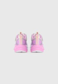Sneakers with a pink and purple gradient design, featuring a chunky white sole, mesh upper, and a reflective yellow accent on the heel.