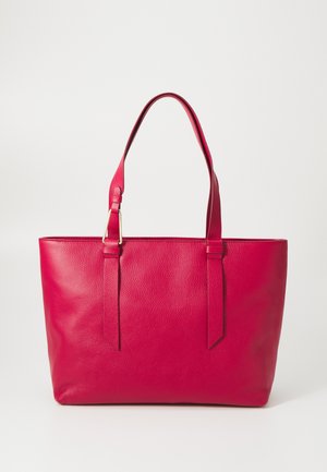 Eheline roosa nahast kott. Omab kahte laia käepidet, tekstuurset viimistlust ja struktureeritud kuju. Nähtavaid riisteid või aksessuaare ei ole.