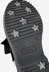 Next Schnürer - black