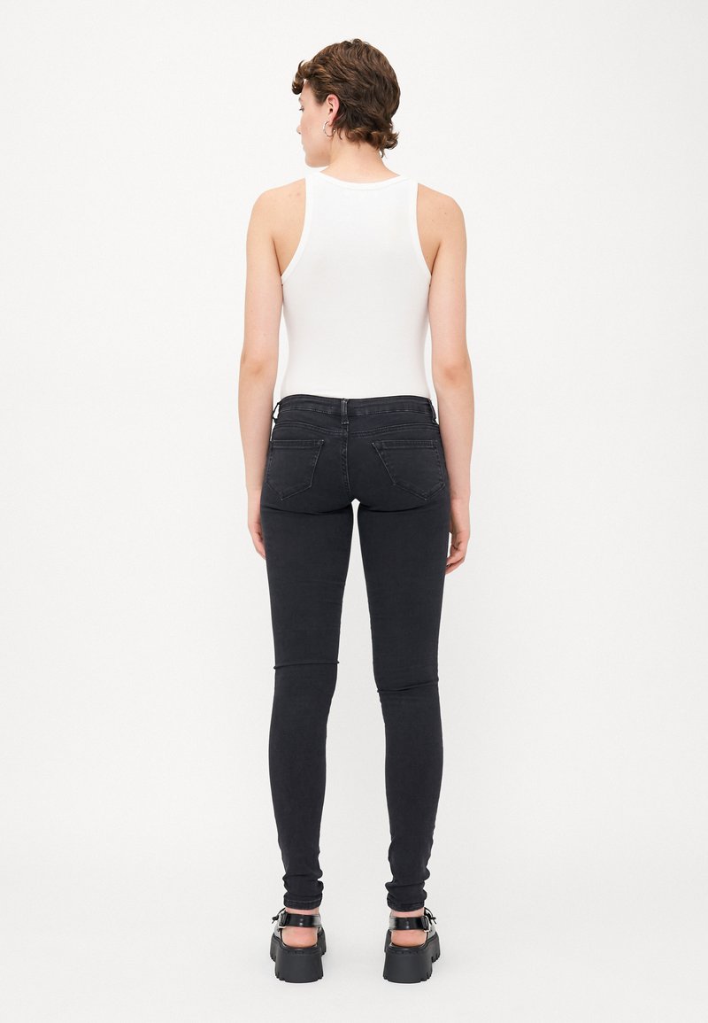 Pantalon Jeans Noir Délavé Acide ONLY Coral Super Skinny Taille Basse - Taille 38 (W30/L30) - Très Bon état
