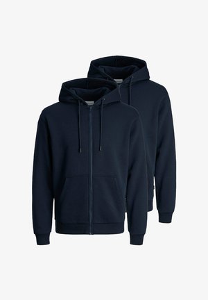 Felpe con zip blu navale in un morbido tessuto, dotate di cappuccio regolabile con cordino, tasche a marsupio e polsini e bordo a costine. Due felpe esposte.