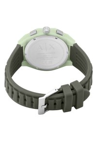 Armani Exchange AX4171 watch with a stainless steel back, green silicone case, and a dark green textured rubber strap. Silver-tone buckle.