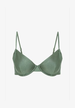 Žalias smaragadinis liemenukas su lygiu tekstūru, kauliniu palaikymu ir reguliuojamomis plonomis petnešomis. Yra subtilus šoninis raukšlių detalė.