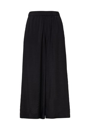 Pantalons noirs à jambes larges avec une taille élastique, fabriqués en tissu léger et texturé, présentant de légères plis pour ajouter de la dimension.