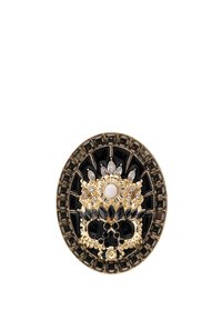 Gold-toned brooch featuring intricate black enamel design, gem accents, and floral motifs. Oval shape with a mix of textures and glossy finish.