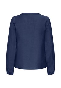 Maglietta a maniche lunghe blu navy con scollo rotondo, in tessuto testurizzato e vestibilità rilassata. Nessun motivo o dettaglio hardware notevole.