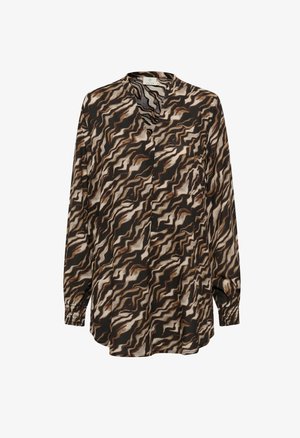 Blouse à manches longues avec un motif ondulé marron, noir et crème. Dotée d'un décolleté en V et de poignets froncés, fabriquée dans un tissu léger.