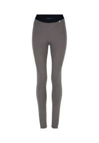 Leggings grigi con design aderente, vita elastica nera e texture liscia. Realizzati in un tessuto elastico per garantire comfort.