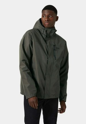 Dunkelgrüne, wasserdichte Jacke mit Kapuze, Frontreißverschluss, Brusttasche und dezenten Branding vorne links oben. Glattes, leichtes Material.