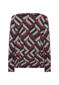 Långärmad topp med ett geometriskt mönster av sammanflätade burgundy, svarta och vita former som bildar en abstrakt design.