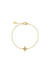 Guldkedjearmband med en stjärnformad berlock med en klar sten i mitten, polerad yta och justerbar längd med spänne.