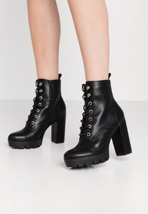 High heeled ankle boots - black