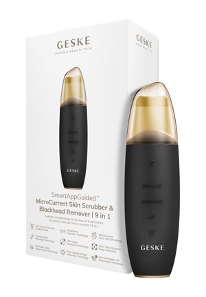 Microdermabrasion compacte microcourant noire et dorée avec capuchon de protection, présentée à côté d'une boîte blanche avec texte de marque et caractéristiques.