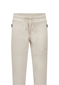 Beige joggers van zacht materiaal, met een elastische tailleband met trekkoord, zijzakken met rits en gestikte paneeldetails.