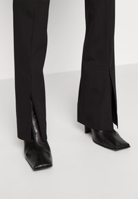 HUGO Broek - black