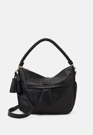 Black leather handbag with braided handle, tassel detail, zipper closure, and adjustable shoulder strap against white background.