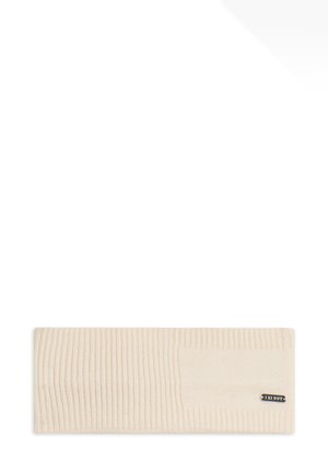 Bandeau en ribbed beige avec une section lisse contrastante, arborant une petite étiquette métallique de marque. Texture tricotée douce, de forme approximativement rectangulaire.