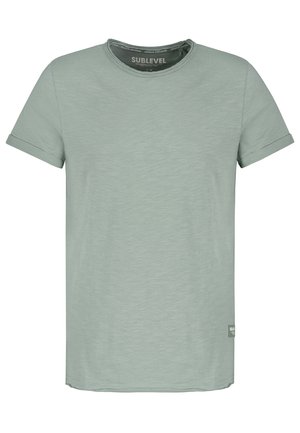 Light green short-sleeve crew neck T-shirt with rolled cuffs and small side label, laid flat.