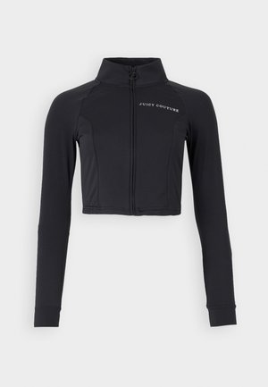 Veste noire courte en tissu extensible, dotée d'un col montant, de manches longues et d'un zip frontal avec le logo "JUICY COUTURE" en blanc.