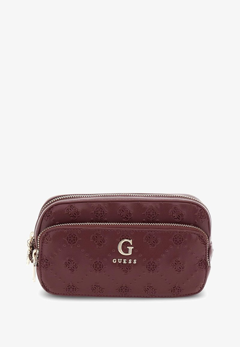 Burgundia faux nahast kosmeetikatasku, millel on reljeefne lillemuster, kahe tõmblukuga sulgur ja kuldne "G" logo ning brändi nime aksent.