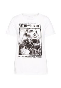 Biała bawełniana koszulka z nadrukiem graficznym przedstawiającym twarz kobiety oraz tekst. Krótkie rękawy i okrągły dekolt z luźnym fasonem.