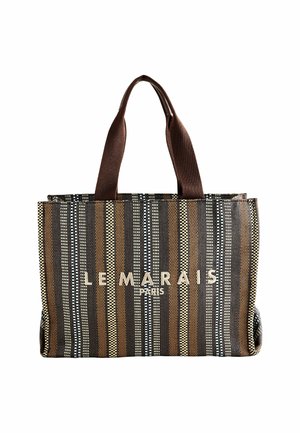 Brown and tan striped tote bag with a textured weave and sturdy brown handles. Features logo "LE MARAIS PARIS" in white lettering.