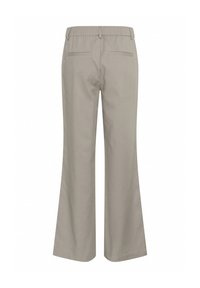 Pantalons évasés beiges avec une taille élastique, fabriqués en tissu lisse ; dotés de deux poches arrière avec un simple détail de couture.