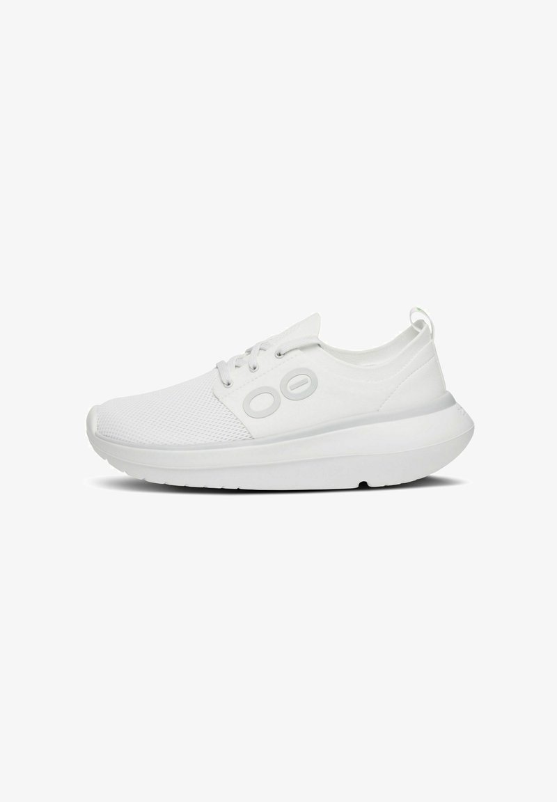 White athletic shoes with a mesh upper, padded collar, and rubber outsole. Features round eyelets and a pull tab at the heel.
