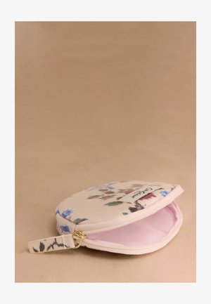 Ringikujuline lillekott kreemjas kangas roosa voodriga, millel on mitmevärvilised lillemustrid ja kuldne tõmblukk koos randme rihmaga.