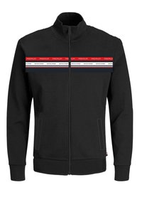 Giacca nera con zip, dotata di un alto colletto, tasche laterali e una banda logata orizzontale in rosso, bianco e nero sul petto.