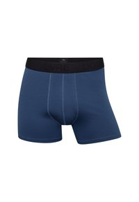 Boxershorts i navyblå bomuld. Har en sort elastisk talje med præget branding. Glat tekstur og tætsiddende design.