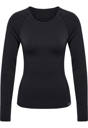 Zwarte longsleeve top gemaakt van rekbaar materiaal. Heeft een ronde halslijn en raglanmouwen, met een subtiel logo aan de zoom. Soepele textuur.