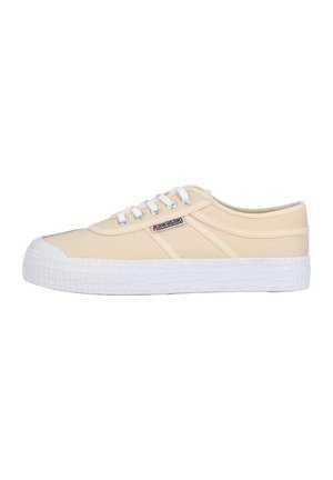 Sneakers in canvas beige con suola in gomma bianca, punta rotonda e sei occhielli. Presentano un'etichetta logo laterale e suola testurizzata per una migliore aderenza.
