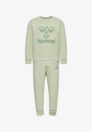 Light green sweatshirt and pants set, featuring a large "hummel" logo in darker green. Made from soft fabric with ribbed cuffs and waistband.