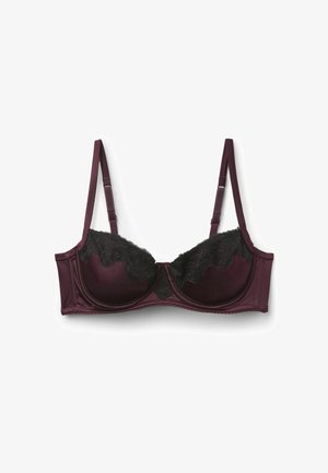 Burgundy bra with padded cups, black lace trim on the top edge, adjustable straps, and a smooth satin finish. Hook-and-eye closure at the back.