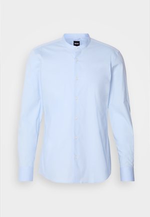 Light blue long-sleeve shirt with a stand collar, featuring a button-front closure and smooth cotton fabric. Includes cuffed sleeves.