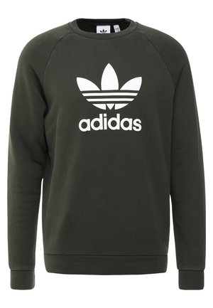 Tmavě zelená mikina Adidas s bílým logem Trefoil a textem uprostřed vpředu, dlouhými rukávy a kulatým výstřihem.