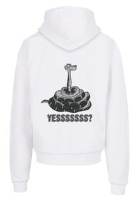 Hvit hettegenser med et grafikk av en slange som er somlet opp med et tegneserieinspirert hode over teksten "JAASSSSSS?" i grått. Mykt stoff, ledig passform.