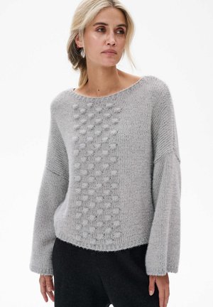 - Sweter