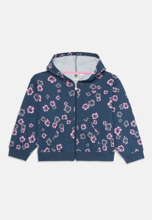 Marineblå hettegenser med glidelås og mønster av rosa og grå hibiscusblomster, frontlommer og hette, designet for jenter.