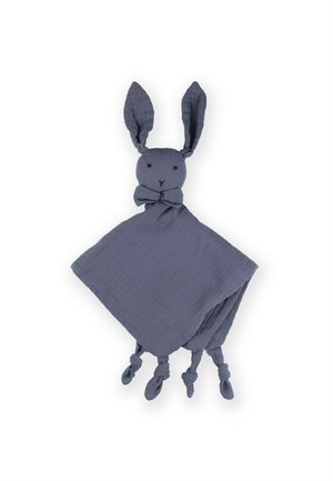 Gray muslin security blanket shaped like a rabbit, with long ears, a knotted mouth, and knotted corners. Soft texture and simple facial features.