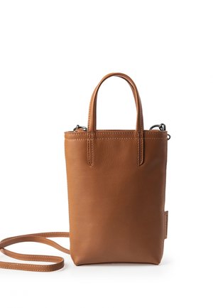 Petit sac à main en cuir fauve avec doubles poignées et bandoulière amovible, forme rectangulaire, design minimaliste et coutures visibles.