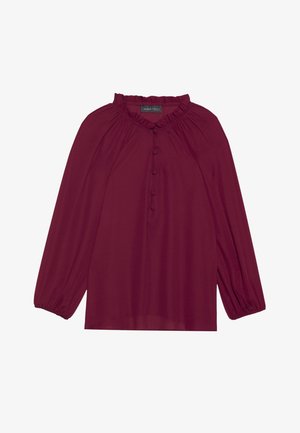 Burgundská blůza s dlouhými balónovými rukávy, volánkovým výstřihem a zapínáním na knoflíky. Měkká, lehká látka s hladkou strukturou.
