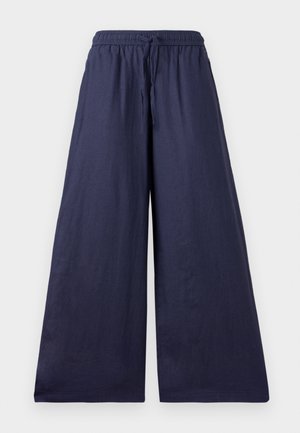 Marinblå vida byxor med elastisk midja, snörningsdetalj och mjukt, lätt tyg. Enkelt, flödande snitt utan utsmyckningar.