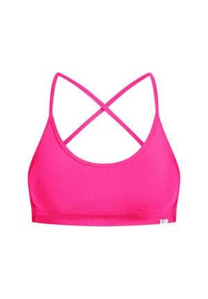 Un soutien-gorge de sport rose vif avec une texture lisse, présentant des bretelles croisées dans le dos et un décolleté arrondi. Marquage minimal au niveau de l'ourlet.