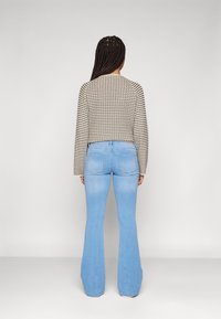 ONLY ONLREESE RETRO - Jeans a zampa - light blue denim